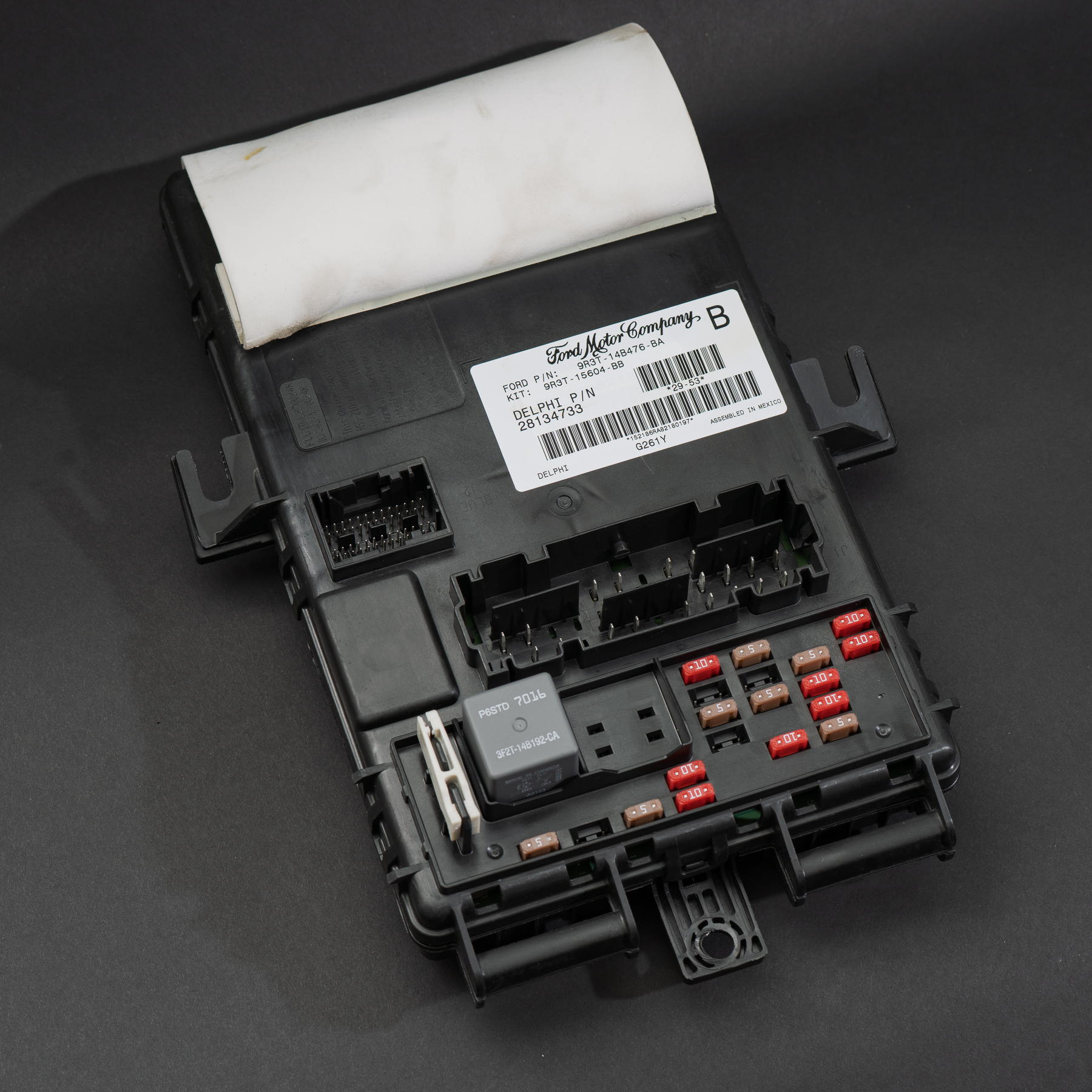 Reconditioned Ford Smart Junction Box, part number 9R3T-14B476-BA, shown from above with fuse panel and connectors visible